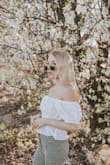 I love this top! I'm really petite, so it was a bit large on me. However, I like the off the sholder look so I don't mine it being a bit oversized! - Deidre S.