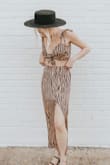 I have the matching top and it's such a cute set! I get a lot of compliments when I wear it. xx - Deidre S.