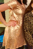 This dress is super cute, but the sequins fall off really easily. I only wore it once and I was finding sequins around the house for weeks. Fun for a girls night out but be prepared to deal with the loose sequins! - Bianca U.