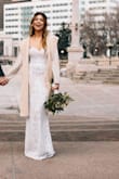 I loved this dress for my court house wedding! It was the perfect fit and sparkle! I would say high high shoes recommended as I did have to pick it up so it didn't drag. I didn't wear a bra with mine since it was nice and tight. - Estefania E.