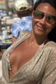 LOVE this cover-up! It's sheer, sexy and glam! Covers exactly what it needs to! I'm 5'5" and had to have it shortened to wear with flip flops to the beach but it was worth it! Love how it shimmers in the sun! - Michelle S.