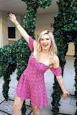 This dress is such a cute style and color. Love this for spring and summer brunch or day with the girls. Looks good with flats or a little bit dressed up. No issues with the dress falling down but the sleeves need to be readjusted every so often, as can be expected with this style of dress. - Kelsey H.