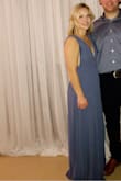 I loved this dress. Though I usually am a medium in most clothing, I ordered a small cause I don't have much of a chest and it's not form fitting. It fit perfect. The material is nice and thick, definitely not cheap. - Taryn B.