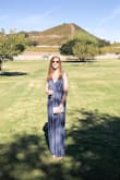 Love this jumpsuit. I am a tall girl and finding jumpsuits is a challenge. This was the perfect length, long enough but not so long it drags. Wore it for a wine tasting tour in Malibu with flat sandals and was very comfortable. Would definitely recommend! - Meredith G.