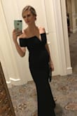 I wore this dress 7 months pregnant to a ball and it was perfect! Just enough stretch to fit my belly bump but still form fitting to the rest of my body. I'm glad I'll be able to wear it again post-pregnancy. Worked best with silicone nip covers rather than a strapless bra which was somewhat visible. I ordered a medium since I wanted to use it as a maternity dress but ended up exchanging it for a small which is my pre-pregnancy size. - Beth