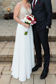 I loved this dress! I wore it for my small wedding and it was perfect. I got a ton of compliments and it was a huge hit!! The dress was super long when I received it but I was able to alter the length and I'm short so this wasn't a surprise. I love this dress so much! You will not be disappointed! - Jessica G.