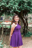 I wore this dress for my graduation pictures and the small fit me perfectly!!! I got the purple one because I go to SFA. The color is vibrant and the dress is flowy, which made pictures fun! Overall, I loved this dress and I cannot wait to see how my other pictures come out! - Azalea R.