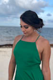 I bought this dress for a beach wedding last August, and loved it! It was flowy and the back was gorgeous. Wear adhesives with it and you're good to go. The only thing is that it is VERY long. So I am kinda tall, 5'7, and it ran probably 2 inches too long. - Candace L.