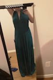 I was really anxious about ordering a dress online but it has been a great experience. And when this dress arrived the pictures just don't do it justice. It's flowy and light. Strong color. And its shape can match any body type. Just love it!! - Ebony F.
