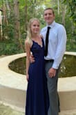 This dress is beautiful and fit me perfectly! I wore it to a wedding in Hawaii and got countless compliments. I am 5'5 and had to get it hemmed a little because it is pretty long but looked perfect otherwise. Would definitely recommend for any nice occasion! - Melia R.