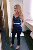 Long for us short girls, so had to get the legs hemmed. Other than that it fit great! Paired with a belt, it was very slimming and made me feel amazing for New Year's - Aly C.
