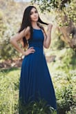 This dress fits well. It's really long and perfect if you're going for a whimsical look. - Julie G.