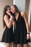 The dress is so pretty. It's a thicker material so it lays nicely. It's not too low, but could use a little stitch to hold the neckline together a bit.  The length is short but not too short. The necklace is also from Lulus. - Jodi S.