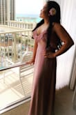 I'm wearing this beautiful dress for a friend's wedding in Hawaii today. It's very comfortable, fits perfect and I got lots of compliments. - Genie J.