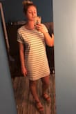 Obsessed with this dress!! It's super comfy, cute yet casual. I haven't had the chance to wearing it yet but can't wait to. The fabric is fairly thick, but part of what makes it so comfortable. Also, fairly loose fitting. I am usually between an Xs-S and went with the small, it's definitely loose fitting but the Xs was wayyy too short and tight on the booty. Definitely recommend! - Lauren C.