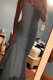 The color is perfect and the dress is structured great so I didn't have a problem with it falling down. It fit me perfectly but closer to the small side. - Kristen M.