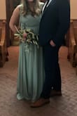 This dress was so comfy, beautiful and flowy. I had to get it altered as the bust/strap area was SUPER long - from the other reviews I was expecting to have to get it altered a bit but it ended up being perfect for a wedding I was in, my sister and I ordered the same dress and we both had to get the straps altered. Otherwise you'll be constantly pulling them back up. Also had the bust area stitched closed, but definitely not necessary. I wore 4 inch heels and it was a little long, probably should have had it hemmed. The color is super beautiful sage, a bit different than the picture shown, a bit deeper, closer to the picture with the models not the studio lighting. - Taylor P.