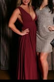 Nice color, fit was good but the dress was overall a little long for my height. Low neckline in the front. - Kelsey O.