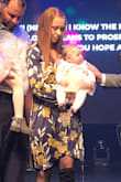 I bought this dress for my daughters baby dedication. I wore a camisole under because it was very low cut for church! Being a wrap dress it's perfect for breast feeding! I have received many compliments and it's great quality! - Tracie L.