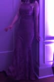 It was perfect in every way, except it was a little loose around the waist. It also was too long for me, even in 5 inch heels so I had to get it altered. Once I did though it was perfect and comfortable enough to wear for hours. You can't really see it in the picture but I got the mauve color and it was beautiful, but a little warmer than the picture on the model. - Anna B.