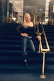 I wore this for a Blues Concert in Chicago and it was perfect! A little short, but a size larger would have been too loose on the back. - Tami U.