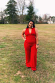 I really loved this jumpsuit and am thankful that I bought it, however, if you don't have a flat stomach, everything kind of shows! I wore it to my formal and I am all about advocating for bigger bodies in tighter clothing, so I was fine! I do not recommend going braless if you have a bigger bust, but I was very impressed with the quality and how comfortable it was. It didn't fit amazing on my back, I felt it come up a little bit instead of going entirely across my back. - Giuliana F.
