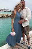 This dress was worn as a bridesmaids dress. A stick on bra works perfect for it. It was so comfortable and fit perfectly. I am tall though and wore it with flats, so I can see it maybe having to be altered in length. - Brandy