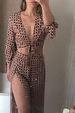 Love this outfit so much! Will look forward to wearing it in summer and on vacation! The waist of the bottoms are loose on me and I may get it taken in a little at the top. Also may add a little stitching or pin wear the fabric edges meet at the top of the leg so that if a gust of wind came by it won't show my booty. But that's a very easy fix! It looked even better than I expected! I was worried the top may be to revealing and open when I ordered it but I felt comfortable wearing it and don't think I'd need to use tape. Highly recommend both the pant and the top! A funky and sexy vibe! - Jaime S.