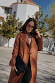 I absolutely loved everything about it. It goes with pretty much everything in my closet because of the length and color. I've also been asked quite a few times if it's real leather & complimented by strangers! Haven't stopped wearing it! - Keren M.