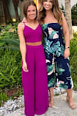 I wore this outfit for a beach vacation and I love it! The bottoms were a tiny bit tight around the waist- I wish I could have gotten an XS top and just a small bottoms. The slits go very high up on your leg especially when you walk but if you're monitoring it, it's not bad. Loved the color too, so vibrant. The perfect vacation piece. - Emily H.