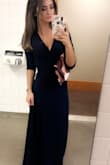 I'm a small girl, most things I buy I have to get taken in especially dresses. I got this dress not even realize it was a "Wrap" dress, that was the most AMAZING surprise! Dress fit amazingly because I could make it as tight or loose as I wanted. Have never been more happy with a dress. - Stefanie B.