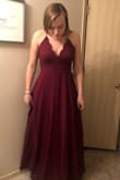 I ordered this dress for a wedding that I am in coming up and it is very elegant and beautiful, while also very flattering. I love the design on the front and it makes my waist look very slim. It is the perfect dress for a bridesmaid or any other formal event. - Abigail V.