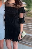 I loved the dress!! It was so fun and different but still looked cute! It was loose but still looked flattering. I would totally recommend it. - Olivia S.