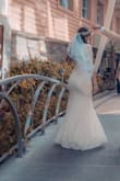 This is a beautiful dress. I used it as my wedding dress, I loved it. The material is good and looks like it is in the photo. - Jessica G.