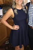 The fabric on this dress is really thick so it doesn't conform to your body at all which I like! I ordered a size too big otherwise I think the fit would be perfect. Great dress for weddings and you can re-wear and dress differently multiple times. - Lindsey H.