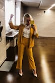 I bought this suit for a job interview and everyone loved it!! The interview was last minute and I overnighted this suit and it ended up being a few inches too big. I used some clips and pulled the pants tight and the jacket covered the clips! I was so obsessed with this look. I will be wearing this all the time!! (PS the photo is me trying to act confident before the most nerve racking interview of my life!!) - Megan R.