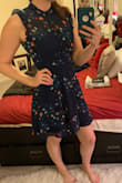 This was so cute in all the photos, I wanted to love it. I just didn't. The high neck and short skirt didn't work on me at all. The sleeveless ruffled shoulder made me look like I had wrestlers arms which is not what I was going for! This is definitely for more petite ladies. - Lara S.