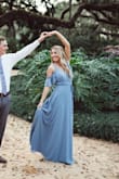 I wore this dress for my engagement pictures and I love it! The only thing I had a problem with was the length being a little long and the top kept coming down a bit but it is a beautiful dress for twirling! - Becca K.