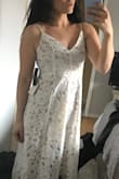 I bought this dress to wear to my bridal shower and I LOVE IT. I'm not in dresses very often as I have an athletic figure, but I wanted something sweet and romantic but still hot, and this dress is it. The fit is great, it's fitted through my rib cage without being suffocating, low cut but still modest, and flowy without trying too hard. I can't wait to see how it looks with hair, makeup and heels. - Laura C.