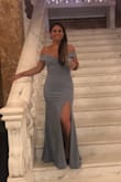 This dress was comfortable and fit perfect. The material feels soft and easy to move around in a wedding/party. - Frances M.