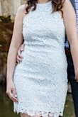 I think this dress is really cute. I also bought this for my engagement shoot. However, it does run a bit small for me. My body type is a bit curvy so lesson learned is if you don't want your belly to show, wear Spanx underneath to hide it. I didn't wear Spanx to put everything in, haha - so certain angles made me look like I was pregnant - Mina L.