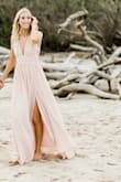 I wore this for an engagement shoot and was completely in love! I have it in navy too! It was a little loose, but the XS was too short. I didn't have it taken in but I might. - Katy K.