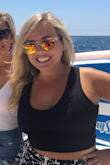 I have this in both black and white. It is super flattering and makes my bust look great. It's also lined (2 layers of material) which is great to prevent your bra from showing or anything else you don't want to be seen if you don't wear a bra that day. Whenever anyone asks me where to find a great, flattering, versatile crop top I always refer them to this one. - Robyn S.