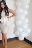 I wore this to my baby shower when I was 20 weeks pregnant. It was perfect to "hide" the bump (since I was in that awkward kind of showing phase). - Alexis B.
