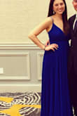 I wore this dress as a wedding guest. It is really beautiful! It was a tad long on me even with 3 inch heels on, but not so much that I needed to hem it. My one problem was that it was a little tight in the bust so I felt like I was constantly checking to make sure my strapless bra wasn't poking out. But I loved the color and style of the dress. - Christina M.