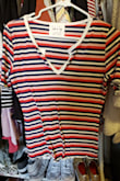 I love the colors and material of this shirt, just wish it was a little longer. Not good if you have a bigger bust, unless you like crop tops. - Estefania M.