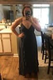 This is a beautiful fun beachy dress. The fabric is okay, but the fit is very slimming. It is very difficult to put on lol. - Taylor S.
