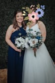 I wore this dress in a friends wedding. It was perfect and super comfortable. I needed it hemmed but that's not saying much for someone my height ;). - Avery C.
