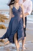 I ordered this dress for my engagement photo shoot. It is definitely long for someone as petite as me; but otherwise fits perfect. The color is so beautiful, and the back is so sexy!. I love this dress, it's a little elegant, light, and sexy. The material does not feel cheap - it's flowy and moves fantastic. I only wish it also came in white; I would totally wear this model for my beach wedding. *ahem* @lulus ;p - Natalia L.