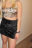 Just a little snug, but super cute! Somewhat shimmery which I liked. I have a pretty long torso so I think it would fit great on someone with an average torso! - Marisa C.